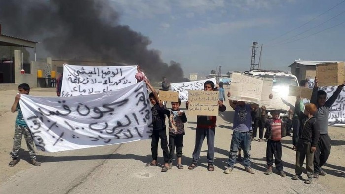 جرحى بمشاجرة بين الأهالي وعناص...