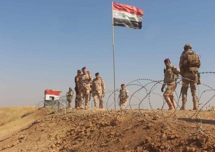جدار إسمنتي عراقي على الحدود ا...