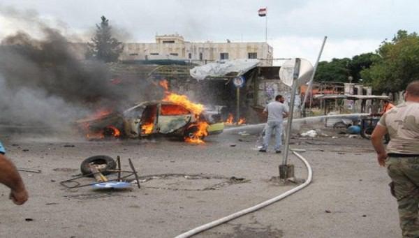مفخخة تضرب حاجزاً للنظام في حم...